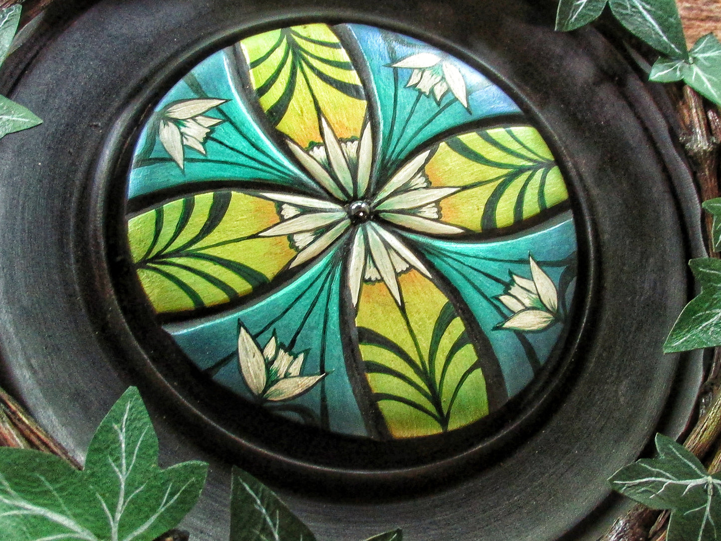 Luthien's device, with ivy wreath