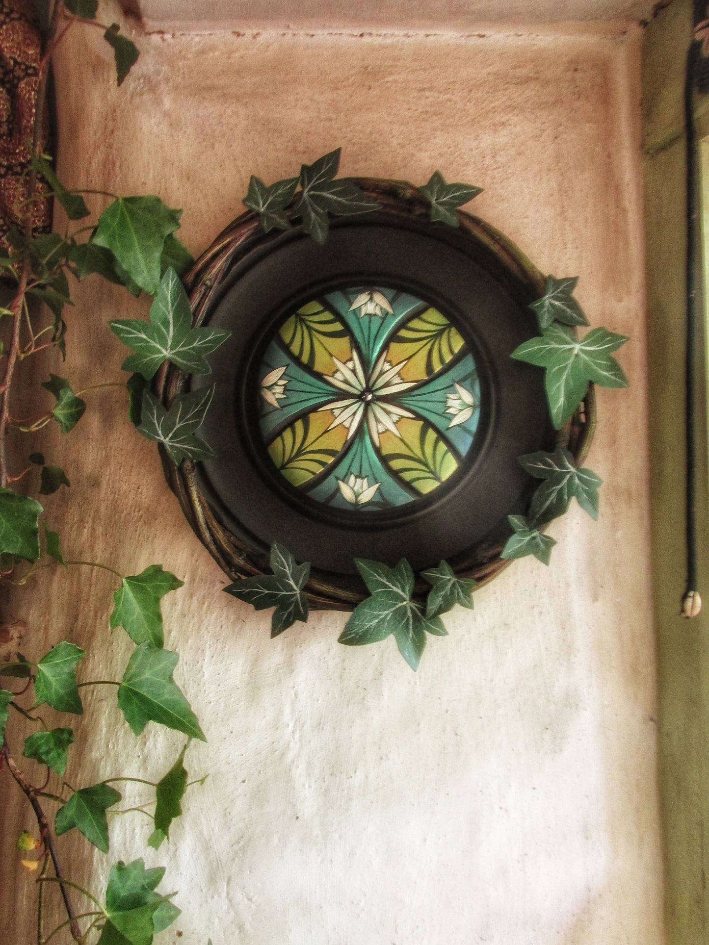 Luthien's device, with ivy wreath